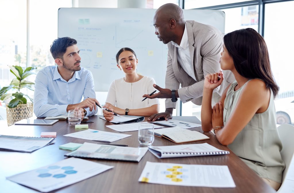 Project management, leadership and planning with business people in meeting for marketing strategy, consulting and teamwork. Collaboration, growth and future with employees in office for research.