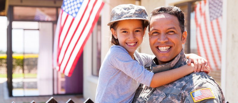 us army soldier and little daughter portrait of us army soldier and little daughter outside their home